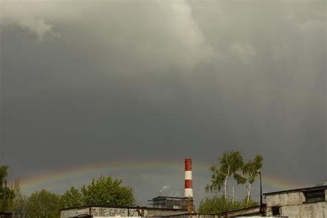 Rainbow in rainy sky. Celestial landscape in industrial area. 11732476 ...