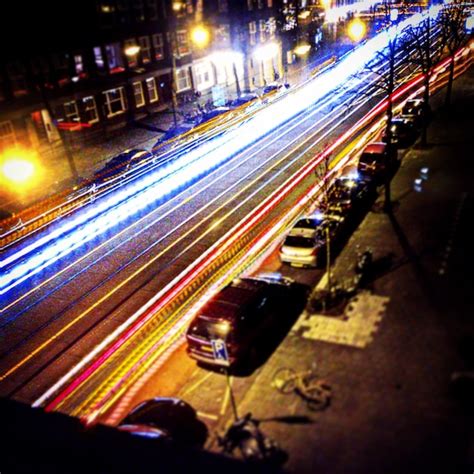 Premium Photo | Light trails on city street at night