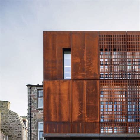 perforated metal facade design google search