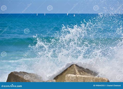 Splash Water of Sea Wave Attack To the Rock Phot with Outdoor Sunny ...