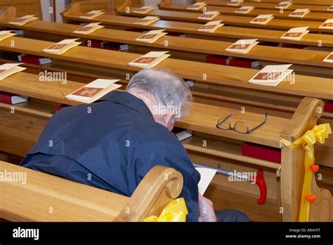 Lonely Old Man Sitting In Church Stock Photo Alamy