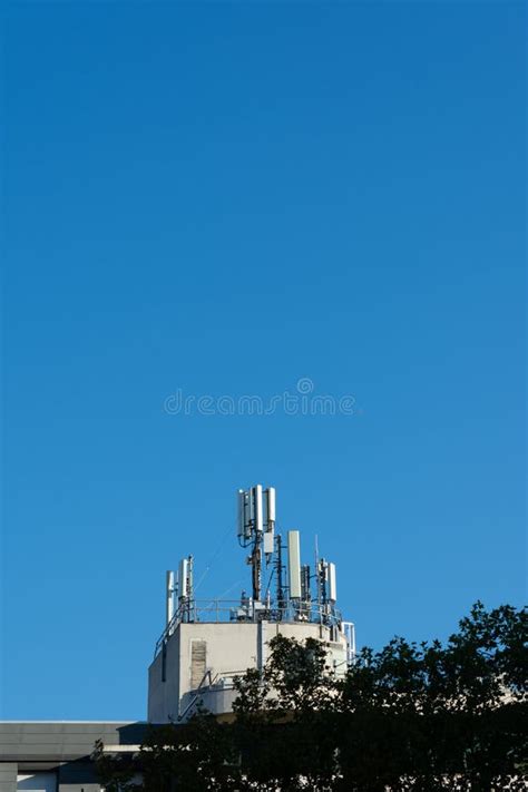 G And G Mobile Phone Antennas Installed On The Rooftop Of A Building