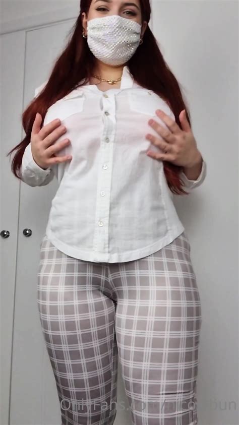 Redhead Fondles Her Tits