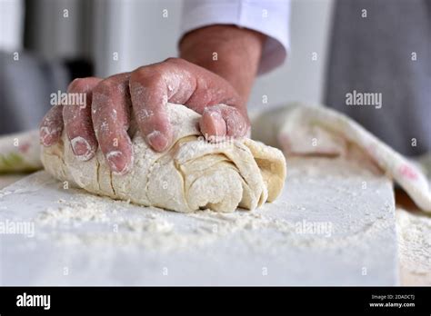 Hands At Work Kneading Dough Hi Res Stock Photography And Images Alamy