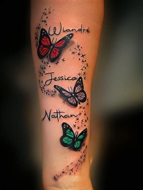 A Woman S Arm With Three Butterflies And The Words We Wander Jesus Nathan