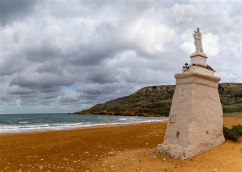 View Of The Red Sand Beach And Staue Of Our Lady In Ramla Bay On Gozo