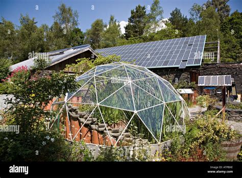 Geodesic Dome Greenhouse And Buildings With Solar Panel Roof Centre