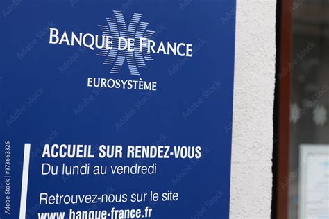 Banque de France logo sign and text with customers information front of official building french ...