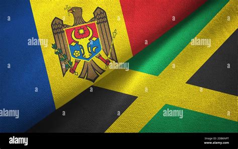 Moldova And Jamaica Two Flags Textile Cloth Fabric Texture Stock Photo