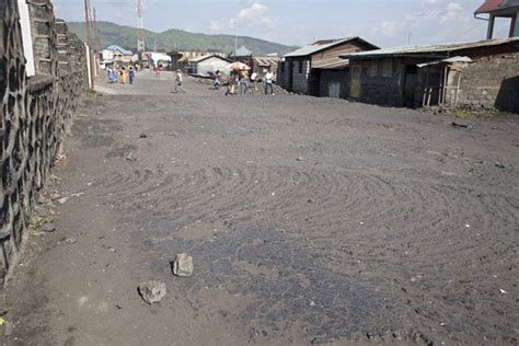 Cars Driving The Main Street Of Goma Goma Travel Story And Pictures