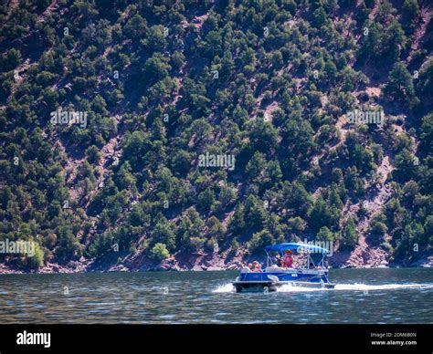 Pontoon boat, Flaming Gorge Reservoir, Flaming Gorge National Recreation Area near Dutch John ...