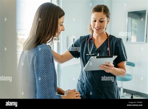 Sitting Communication Smiling Doctor Medical Examination Hi Res Stock