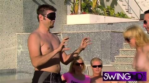 Swingers Are Playing Blindfolded Sex Games Naked In The Pool
