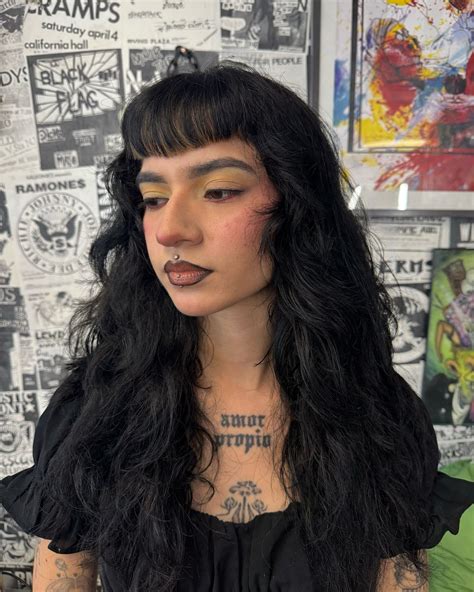 Mya on Instagram: "Refreshed her look with classic Betty bangs and