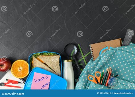 Lunch Box with Backpack and School Supplies Stock Photo - Image of ...