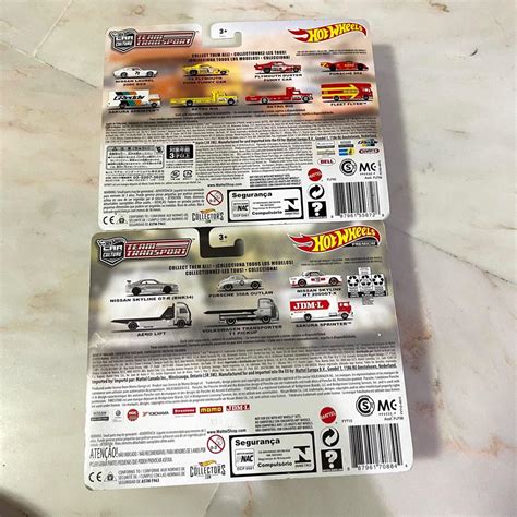 Hot Wheels Team Transport 65 EACH MOMO Porsche 962 Fleet Flyer Nissan Skyline GT R BNR34