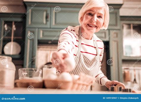 Positive Delighted Granny Cooking Biscuits For Granddaughter Stock Image Image Of Delight