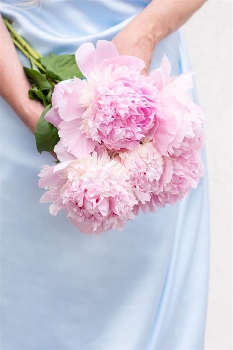 Bride in a Blue Wedding Dress with a Bouquet of Pink Peonies, Pastel ...