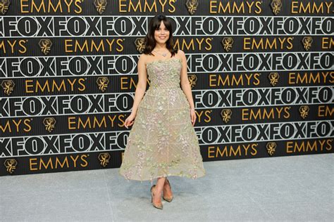 Jenna Ortega Wows on Emmys Red Carpet Wearing Sheer Strapless Dress ...