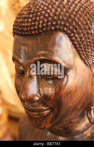 Wooden Buddha Head Smiling Stock Photo Alamy