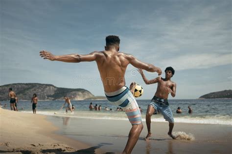 Boys Playing Soccer on the Beach Editorial Image - Image of soccer, brazil: 175225700