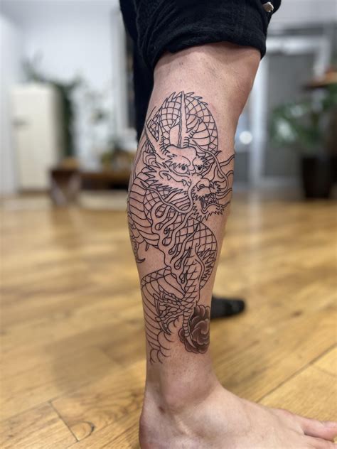 Dragon tattoo on calf by Acetates at Mikiri Gallery, Brooklyn : r/tattoos