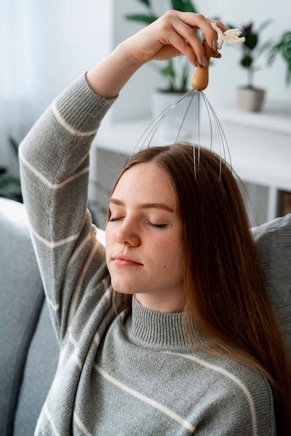 Free Photo Woman Giving Herself Scalp Massage