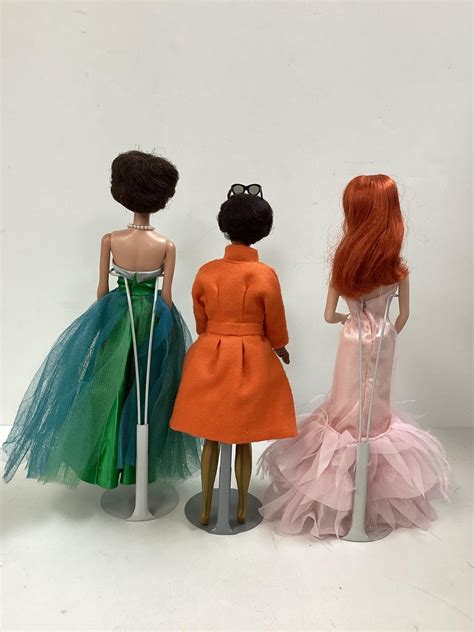 Lot Barbies Including A Vintage Brunette Bubblecut Barbie