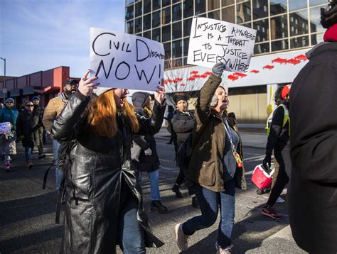 Despite the cold, dozens attend MLK march in Everett | HeraldNet.com