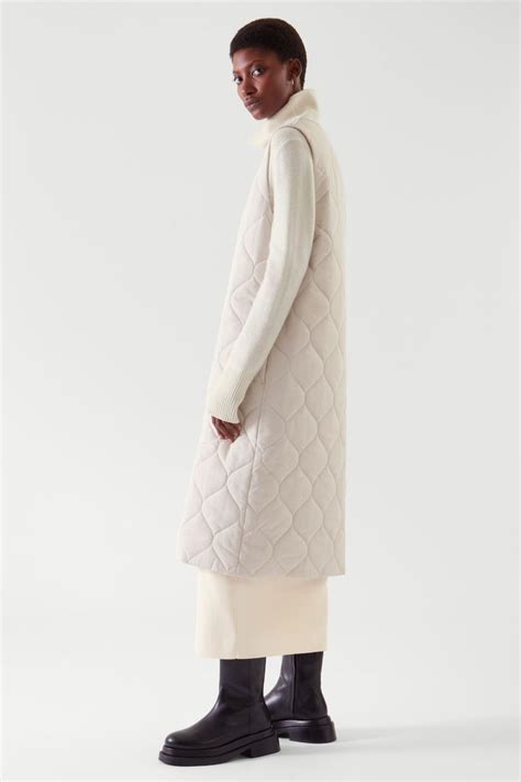 ДЛИННЫЙ СТЕГАНЫЙ ЖИЛЕТ | Coat, Coats jackets women, Jumpsuit with sleeves