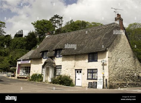 White Walled Thatched Cottage With A Shop Attached Godshill Isle Of