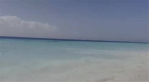 She Warms Her Bikini Before Swimming ThisVid