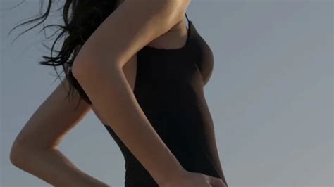 A Brunette In A Black Swimsuit Stands Ba Stock Video Pond