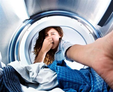 Why Your Washing Machine Smells Like Sewage And How To Fix It