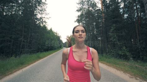 Front View of a Young Woman while Running in Slow Motion Stock Video ...