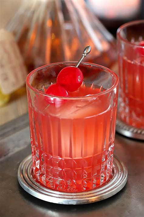 Bourbon And Cherry Old Fashioned Cocktail Closeup With Maraschino