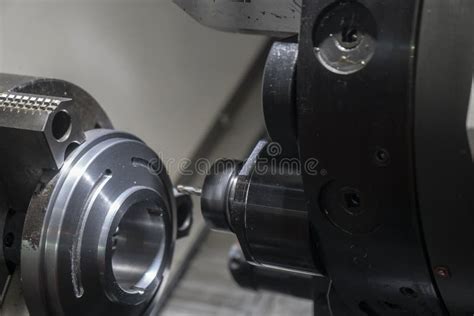 The CNC Lathe Machine Cutting The Groove Slot By Mill Spindle Stock