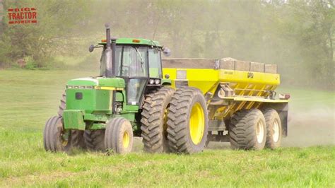 John Deere Tractor Spreading Lime For Corn Planting