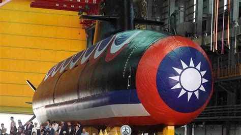 Taiwan unveils first domestically made submarine as tensions with China ...