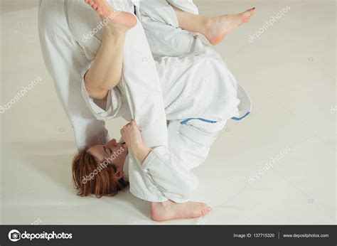 Women's section of Jiu Jitsu. Girls work out the reception. Stock Photo ...