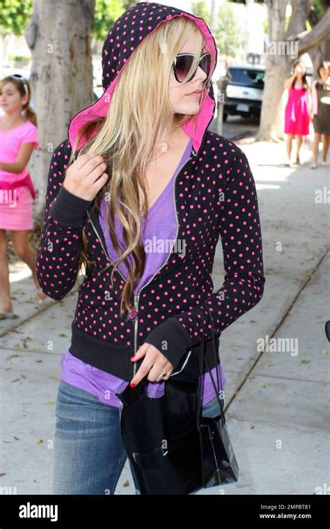 Avril Lavigne And A Female Friend Shop At Chanel In Beverly Hills Ca