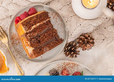 Delicious Semi Naked Chocolate Cake With Caramel Topping And Decorated With Blackberries And