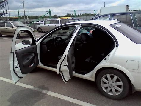 Накладки на пороги (хром с логотипом NISSAN) — Nissan Almera Classic ...