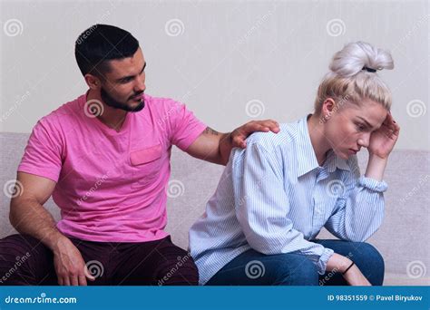 Young Couple Sitting On The Couch After Quarrel Stock Image Image Of