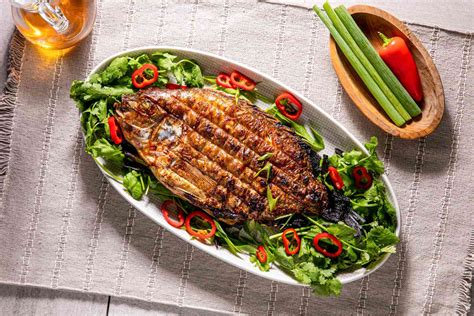 Grilled Whole Fish Stuffed With Herbs And Chilies Recipe