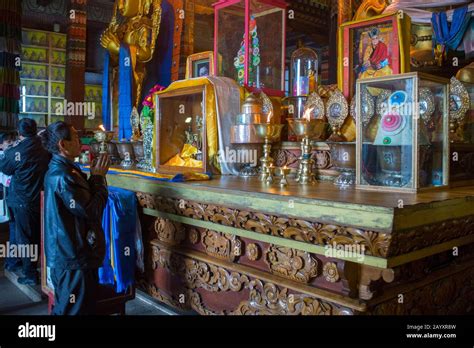 Praying inside temple hi-res stock photography and images - Alamy