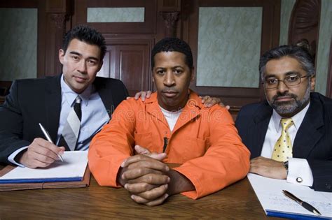 Criminal and Lawyers Sitting in Courtroom Stock Photo - Image of ...