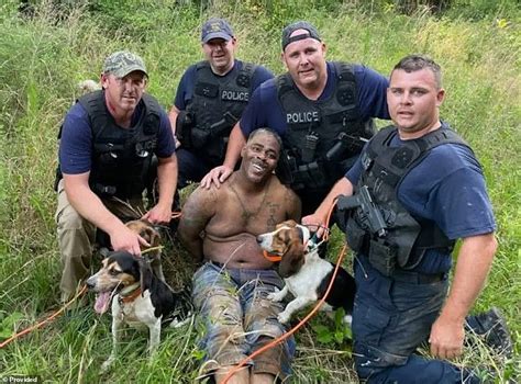 Cops Spark Outrage By Posing For Photo With Bank Robbery Suspect After