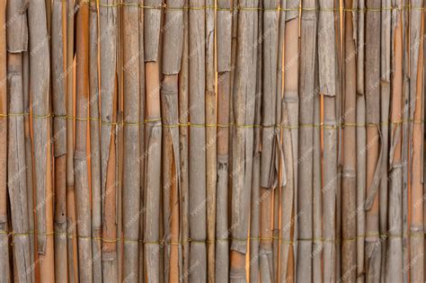 Premium Photo Brown Bamboo Texture Dried Bamboo Wall Or Fence Background