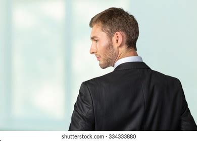 Man Looking Over His Shoulder Images Stock Photos And Vectors